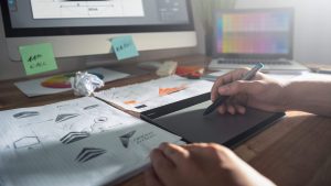 a person designing a logo