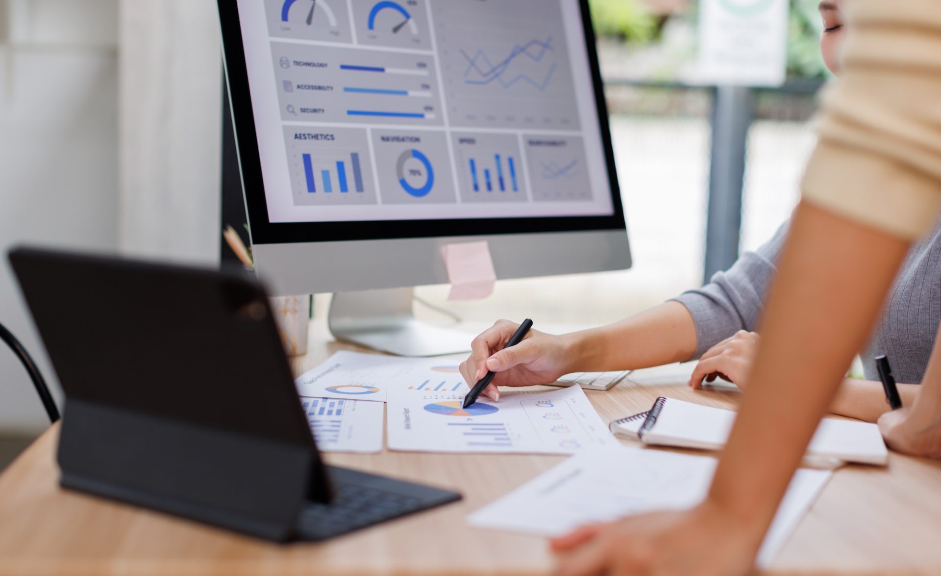 two people looking at statistics